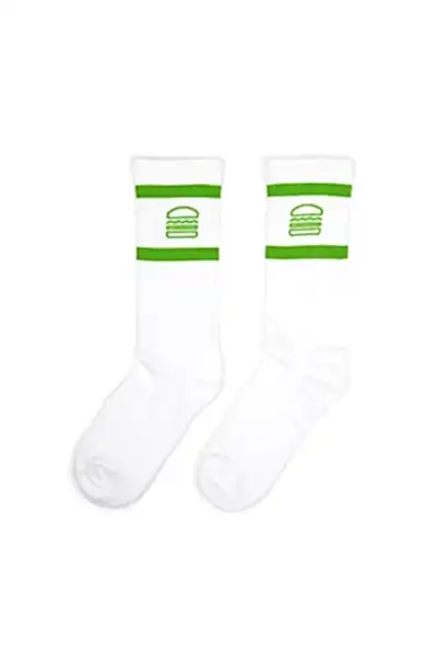 White socks with the Shake Shack logo between two green stripes
